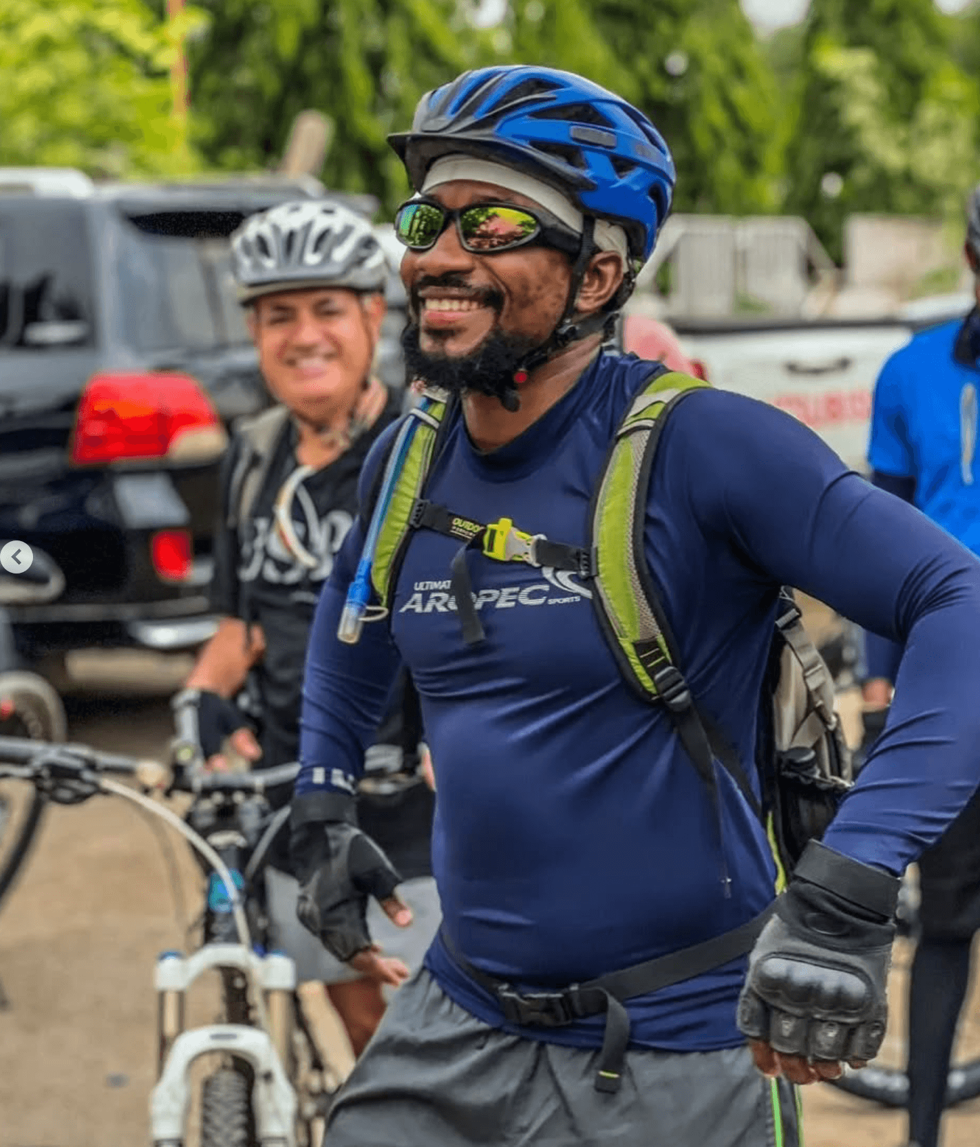 Smiling cyclist in proper safety gear ready for adventure