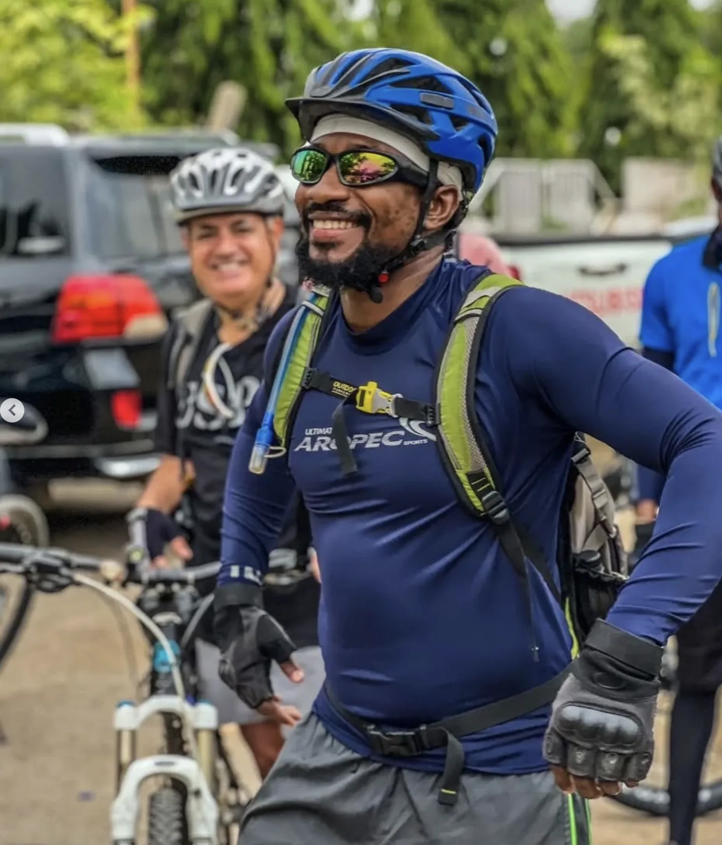 Smiling cyclist in proper safety gear ready for adventure