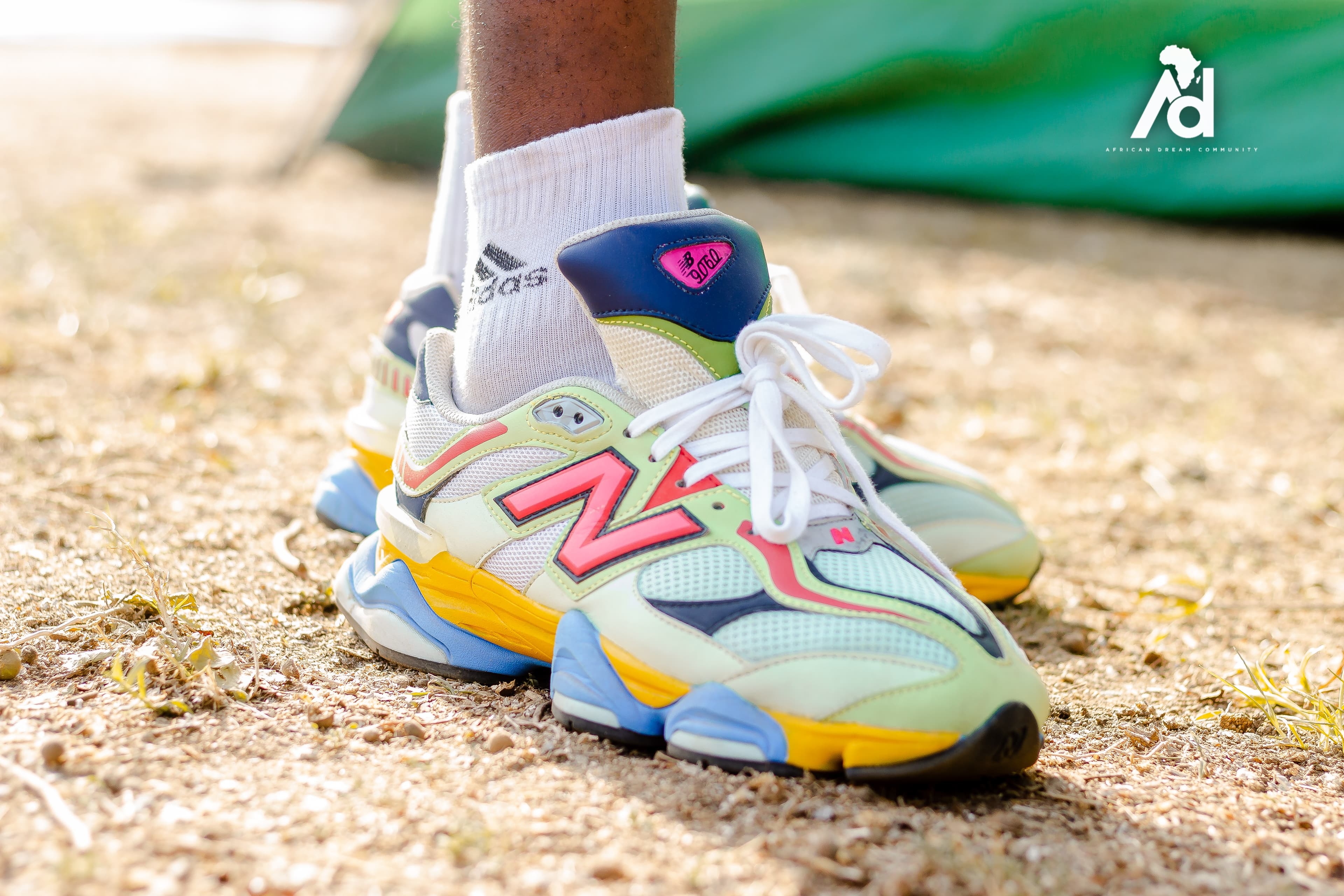 Hiker standing on a ridge overlooking a valley