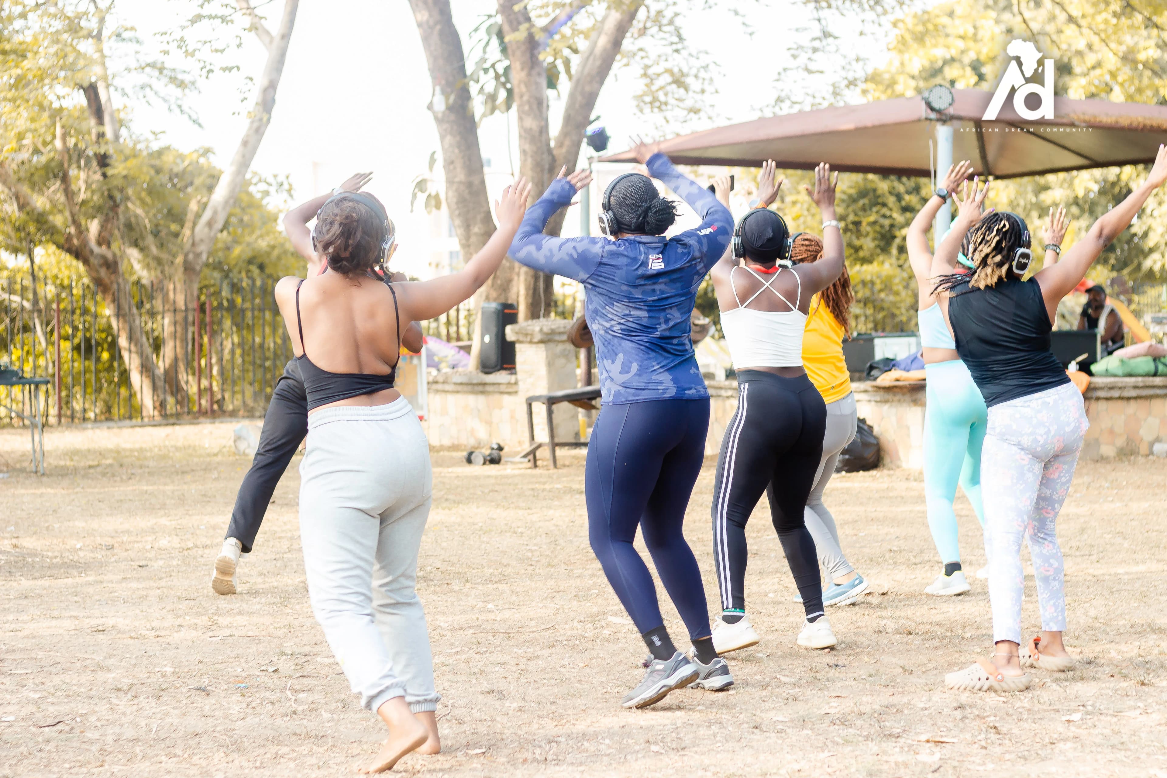 Professional team collaborating outdoors in a lush natural setting